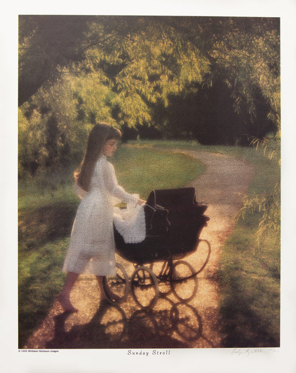 Little girl in a white dress standing the sunlight with her stroller and doll.