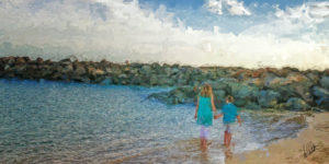 Two Children Walking Along The Beach of Hawaii at Sunset